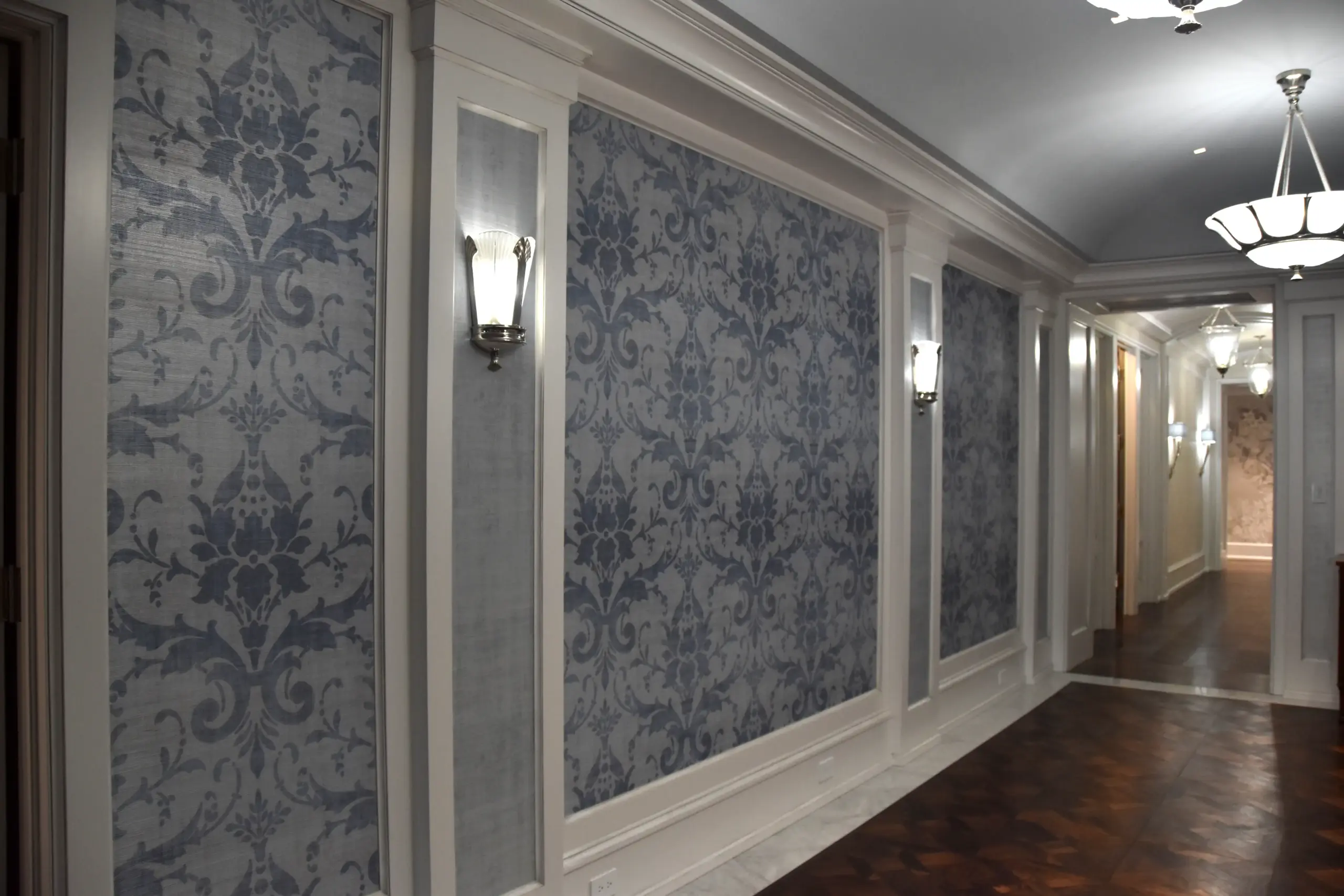 Jacksonville House Painters professional wallpaper installation team working on residential project